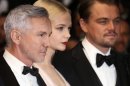 From left, director Baz Luhrmann, actors Carey Mulligan and Leonardo Di Caprio arrive for the opening ceremony and the screening of The Great Gatsby at the 66th international film festival, in Cannes, southern France, Wednesday, May 15, 2013. (Photo by Joel Ryan/Invision/AP)