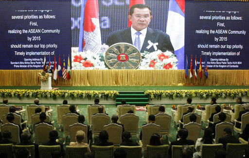 Cambodia's Prime Minister Hun Sen delivers his opening remarks for the 21st Association of Southeast Asian Nations, or ASEAN, Summit in Phnom Penh, Cambodia, Sunday, Nov. 18, 2012.  (AP Photo/Vincent Thian)