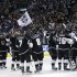 The Los Angeles Kings celebrate their team's 2-1 win against the St. Louis Blues after Game 6 of a first-round NHL hockey Stanley Cup playoff series in Los Angeles, Friday, May 10, 2013. (AP Photo/Jae C. Hong)