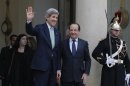 U.S. Secretary of State John Kerry, left, is accompanied by France's President Francois Hollande after their meeting at the Elysee Palace, in Paris, Wednesday, Feb. 27, 2013. Paris is the third leg of Kerry's first official overseas trip, a hectic nine-day dash through Europe and the Middle East. (AP Photo/Francois Mori)
