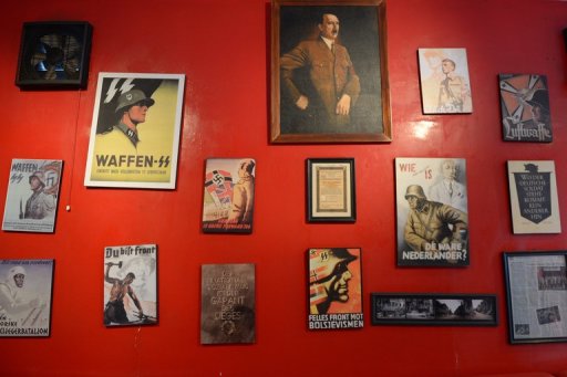 Images of Adolf Hitler and German soldiers decorate a wall at the SoldatenKaffee in Bandung, Indonesia, on July 16, 2013