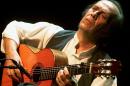 FILE - In this July 12, 2001 file photo, Spanish guitarist Paco de Lucia performs during the 35th Montreux Jazz Festival in Montreux, Switzerland. Jose Ignacio Landaluce, mayor of de Lucia's native Spanish town of Algeciras said in a statement Wednesday Feb. 26, 2014 the world-renowned flamenco guitarist Paco de Lucia has died in Mexico, where he lived. He was 66. The cause of death was not immediately made known. (AP Photo/Keystone, Laurent Gillieron, File)
