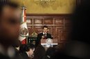 Mexican President Enrique Pena Nieto gives a speech before he received a sword and a sabre as the supreme commander of the armed forces during an event at the Palacio Nacional in Mexico City