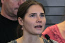 FILE - In this Oct. 4, 2011 file photo, Amanda Knox speaks at a news conference shortly after her arrival from Italy at Seattle-Tacoma International Airport in Seattle. Former American exchange student Knox spent four years in jail in Italy, from her arrest to her conviction in her first murder trial through her successful appeal. She's now facing a second appeals trial, along with her former Italian boyfriend Raffaele Sollecito. (AP Photo/Elaine Thompson, File)