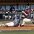 North Carolina's Skye Bolt slides into home ahead of a throw to Florida Atlantic catcher Levi Meyer during the fifth inning at the NCAA college regional baseball tournament in Chapel Hill, N.C., Sunday, June 2, 2013. The run, made possible by a sacrifice fly by North Carolina's Michael Russell, put North Carolina up 2-0.  (AP Photo/Ted Richardson)