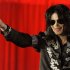 FILE - In a March 5, 2009 file photo US singer Michael Jackson announces that he is set to play ten live concerts at the London O2 Arena in July, which he announced at a press conference at the London O2 Arena. A trial scheduled to begin Tuesday, Sept. 6, 2012 will determine how much a businessman working with Katherine Jackson will have to pay her son’s estate for infringing some of its copyrights. (AP Photo/Joel Ryan, File)