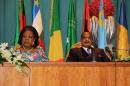 Congo's President Denis Sassou Nguesso (R) and Central African Republic President Catherine Samba Panza attend talks gathering key players in the Central African conflict, on July 23, 2014, in Brazzaville