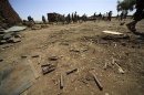 Bullet casings lie on the ground near a destroyed market at Jawa village in east Jebel Marra (South Darfur), 9 km (6 miles) West Deribat
