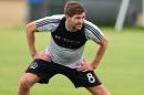 Steven Gerrard stretches while training with his new teammates from the LA Galaxy during a training session open to the media in Carson, California on July 7, 2015