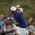 McIlroy of Northern Ireland tees off on the eighth hole during BMW Masters 2012 golf tournament in Shanghai