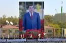 Tajikistan's President Emomali Rakhmon, seen on a banner on November 3, 2013 in Dushanbe, could see the end of any formal opposition after this trial