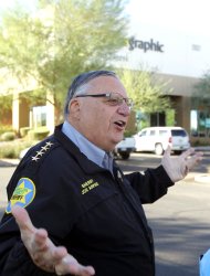 <p> FILE - In this Nov. 1, 2011 photo, Maricopa County Sheriff Joe Arpaio speaks to the media after his deputies conducted a raid at a printing company in Phoenix, arresting six suspects out of 17 they were allegedly looking for. The immigration debate in Arizona reached a boiling point when the state passed a groundbreaking law in 2007 targeting those often blamed with fueling the nation's border woes: Employers who hire immigrants living in the U.S. illegally. It marked a bold step, but an examination of the law by The Associated Press found that it has done little to crack down on problematic employers. (AP Photo/Ross D. Franklin, File)