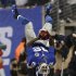 New York Giants' David Wilson does a back flip after running for a touchdown in the fourth quarter against the New Orleans Saints in their NFL football game in East Rutherford
