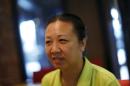 Chinese dissident Liu Xuehong speaks during an interview with Reuters in Bangkok