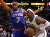 Boston Celtics forward Paul Pierce, right, yells as he tries to drive past New York Knicks forward Carmelo Anthony (7) during the first quarter in Game 6 of their first-round NBA basketball playoff series in Boston, Friday, May 3, 2013. (AP Photo/Charles Krupa)