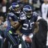 Seahawks Browner and Sherman celebrate Browner's interception against Eagles wide receiver Cooper during their NFL football game in Seattle