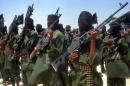 Islamist fighters loyal to Somalia''s Al-Qaida inspired al-Shebab group perform military drills in a village in Lower Shabelle region, some 25 kilometres outside Mogadishu on February 17, 2011