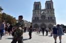 Three women suspected of plotting to blow up a car packed with gas canisters near Notre Dame cathedral are also suspected of having planned to strike a train station in the Paris area