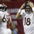 Denver Broncos quarterback Peyton Manning (18) reacts after being sacked by the Atlanta Falcons during the first half of an NFL football game, Monday, Sept. 17, 2012, in Atlanta. (AP Photo/John Bazemore)