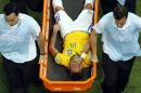 Brazil's Neymar is carried away on a stretcher during the World Cup quarterfinal soccer match between Brazil and Colombia at the Arena Castelao in Fortaleza, Brazil, Friday, July 4, 2014. (AP Photo/Fabrizio Bensch, pool)
