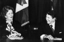 British Prime Minister Margaret Thatcher and President Reagan share a laugh during a meeting of the Allied leaders in New York