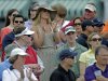 Skier Lindsey Vonn applauds as she watches Tiger Woods  during the first round of the Masters golf tournament Thursday, April 11, 2013, in Augusta, Ga. (AP Photo/Matt Slocum)