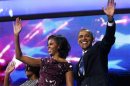 U.S. President Obama, first lady Michelle and their daughter Sasha, wave to delegates during the final session of the Democratic National Convention in Charlotte