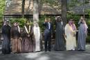 US President Barack Obama (C) poses with leaders of the Gulf Cooperation Council (GCC) for a family photo at the end of a summit meeting at Camp David in Maryland on May 14, 2015