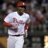 Philadelphia Phillies' John Mayberry Jr.rounds the bases after hitting a grand slam in the 11th inning of a baseball game against the Miami Marlins, Tuesday, June 4, 2013, in Philadelphia. The Phillies won 7-3. (AP Photo/Laurence Kesterson)
