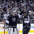 Los Angeles Kings goalie Jonathan Quick, left, celebrates with Dustin Brown after the Kings scored an empty-net goal against the St. Louis Blues during the third period in Game 4 of an NHL hockey Stanley Cup second-round playoff series, Sunday, May 6, 2012, in Los Angeles. The Kings won 3-1 to win the series 4-0. (AP Photo/Mark J. Terrill)