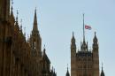 The British union flag flies at half-mast above the Victoria Tower on the Palace of Westminster, in central London on July 3, 2015
