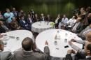 The United Nations Special Envoy to Yemen Ismail Ould Cheikh Ahmed (C) sits with Yemeni rebels during peace talks on June 16, 2015 in Geneva, Switzerland