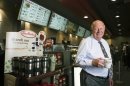 File photo of Tim Hortons Inc interim Chief Executive Paul House posing for a portrait at a Tim Hortons coffee shop in Toronto