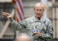 General Martin Dempsey, chairman of the US Joint Chiefs of Staff delivers a speech during his meeting with US military servicemen upon his arrival at the Yokota US military airbase in Tokyo on April 25, 2013. The US's top military officer said in Japan that his troops were ready to act if North Korea turned its increasingly bellicose rhetoric into action
