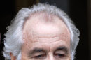 FILE - In this March 10, 2009 file photo, Bernard Madoff exits Manhattan federal court in New York. On Thursday, Aug. 8, 2013, prosecutors in New York filed papers in federal court seeking to have evidence of romantic and sexual relationships excluded from the upcoming trial of some of the Ponzi king's subordinates. Prosecutors claim that that four of five defendants and several government witnesses were at times seeing each other romantically or were sexually involved with one another and one defendant was in a love triangle with Madoff himself. (AP Photo/Louis Lanzano, File)