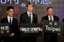 Director Ang Lee, his son and cast member Mason Lee and Joe Alwyn pose before the Asian premiere of the film "Billy Lynn's Long Halftime Walk" in Taipei