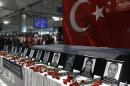 In this Thursday, June 30, 2016 photo, family members, colleagues and friends of the victims of Tuesday blasts gather for a memorial ceremony at the Ataturk Airport in Istanbul. A Chechen extremist masterminded the triple suicide bombing at Istanbul's busiest airport that killed dozens, a U.S. congressman has said. U.S. Rep. Michael McCaul, chairman of the House Committee on Homeland Security, told CNN that Akhmed Chatayev directed Tuesday night's gun-and-bomb attack at Ataturk Airport, one of the world's busiest, which also wounded over 200 other people. Turkish authorities have banned distribution of images relating to the Ataturk airport attack within Turkey.(AP Photo/Emrah Gurel)