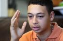 Tariq Abu Khdeir, 15, speaks during interview at his home, Sunday, July 20, 2014, in Tampa, Fla. Khdeir flew home to Tampa last week and said in an interview Sunday that he hopes one day to visit loved ones anew and 