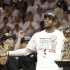 The Miami Heat's LeBron James holds the the Larry O'Brien NBA Championship Trophy after Game 7 of the NBA basketball championship against the San Antonio Spurs, Friday, June 21, 2013, in Miami. The Miami Heat defeated the San Antonio Spurs 95-88 to win their second straight NBA championship. (AP Photo/Lynne Sladky