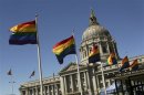 Rainbow colored flags fly outside City Hall in San Francisco