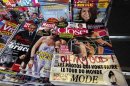 Copies of French magazine Closer showing pictures of Catherine, Duchess of Cambridge, and Britain's Prince William are displayed in a newspaper kiosk in Nice