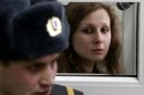 Alyokhina, a member of the female punk band "Pussy Riot", attends a court hearing in Berezniki