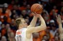 Syracuse's Trevor Cooney shoots against Georgia Tech during the first half of an NCAA college basketball game in Syracuse, N.Y., Tuesday, March 4, 2014. (AP Photo/Kevin Rivoli)