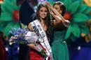 Miss Nevada USA Nia Sanchez is crowned Miss USA during the Miss USA 2014 pageant in Baton Rouge, La., Sunday, June 8, 2014. (AP Photo/Jonathan Bachman)
