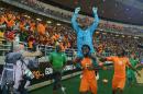 Ivory Coast's forward Wilfried Bony carries goalkeeper Boubacar Barry on his shoulders as they celebrate with forward Gervinho (R) after winning the 2015 African Cup of Nations final on February 8, 2015