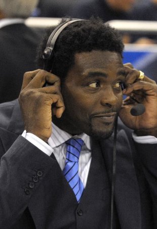 FILE - Chris Webber works as an analyst on the sideline during the first half of an NBA basketball game between the Orlando Magic and Chicago Bulls in...