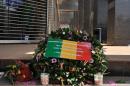 Tributes, including a wreath bearing the Mali flag, were left at the entrance to the Radisson Blu hotel in Bamako on 24, 2015 to honor the dead four days after a jihadi attack killed 27 there