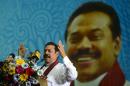 Former Sri Lankan president and parliamentary candidate Mahinda Rajapakse speaks during a rally in Gampaha on August 14, 2015