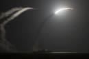 The guided-missile cruiser USS Philippine Sea launches a Tomahawk cruise missile while conducting strike missions against ISIL targets from the Arabian Gulf