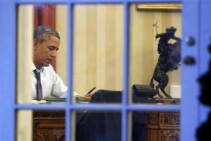 U.S. President Obama sits inside the Oval Office as&nbsp;&hellip;